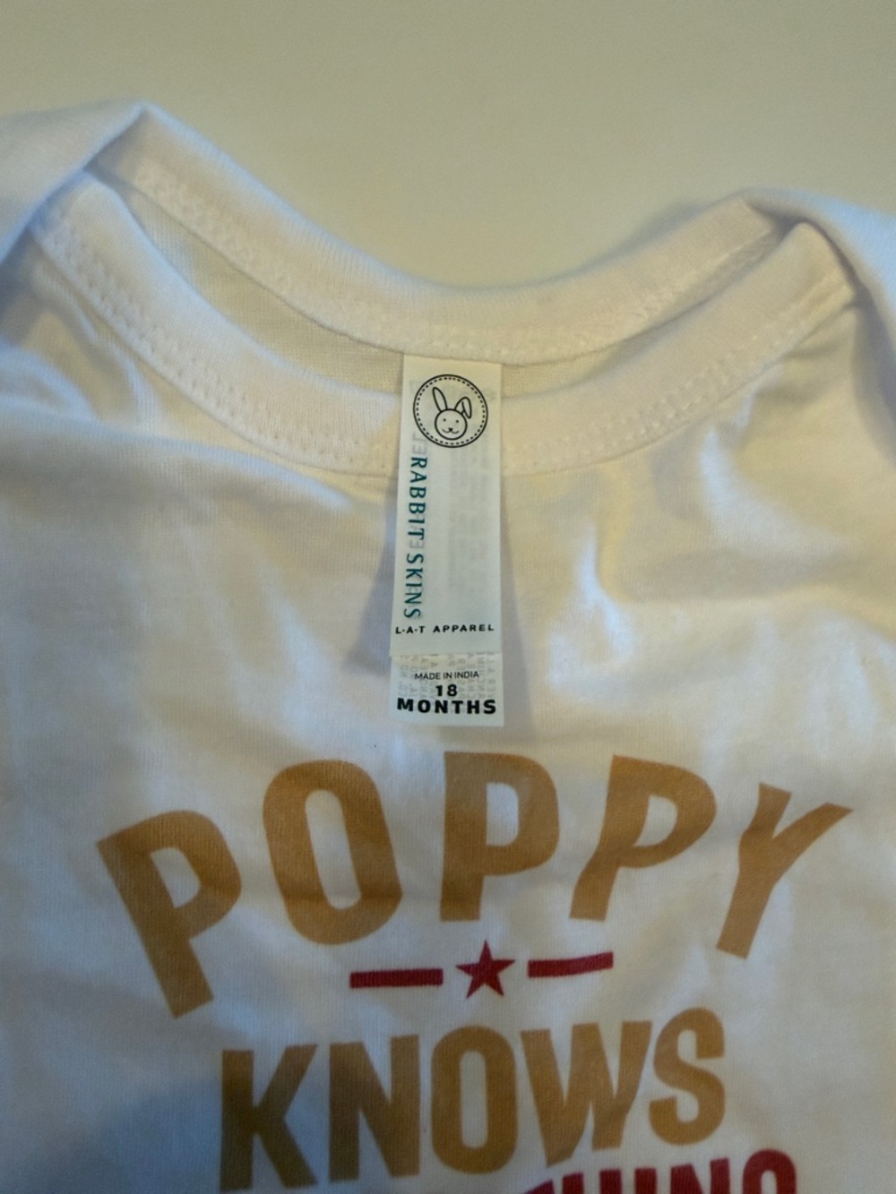 Rabbit Skins White Baby One-Piece with Poppy Graphic - Picture 2 of 3